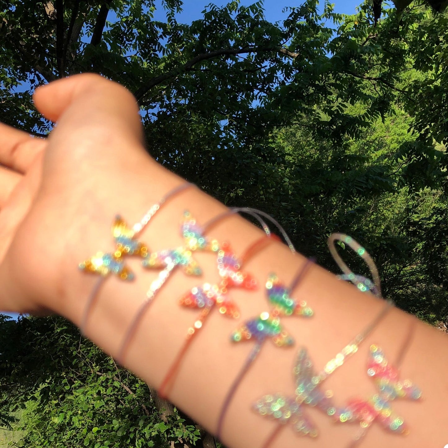 Handwoven gold and silver thread butterfly bracelet