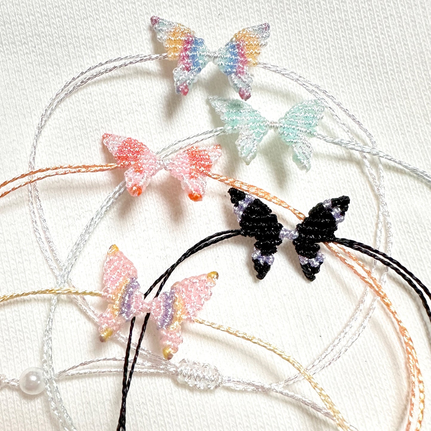 Handwoven gold and silver thread butterfly bracelet