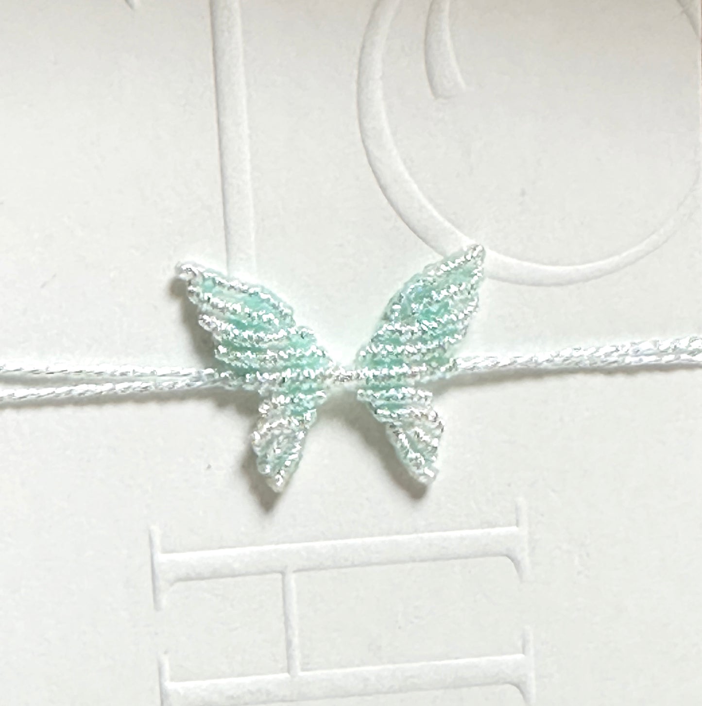 Handwoven gold and silver thread butterfly bracelet