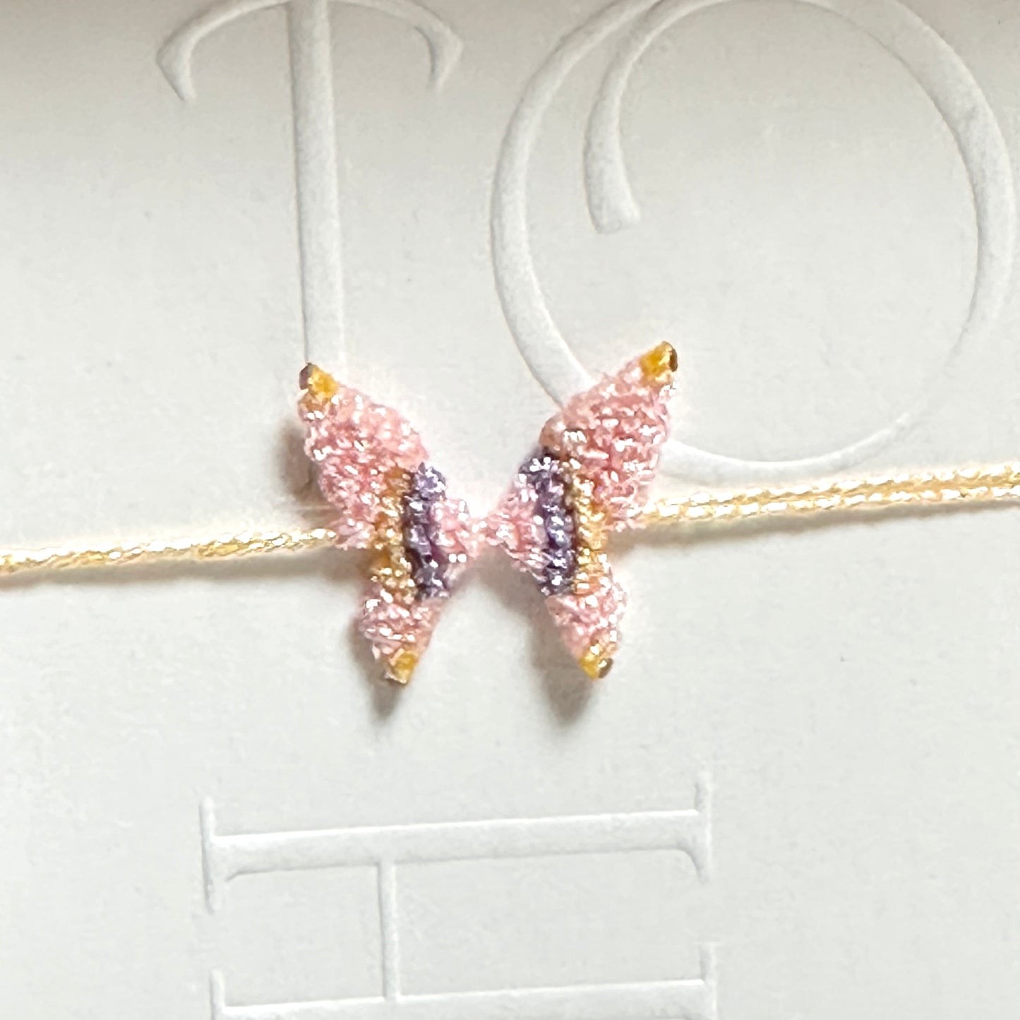 Handwoven gold and silver thread butterfly bracelet