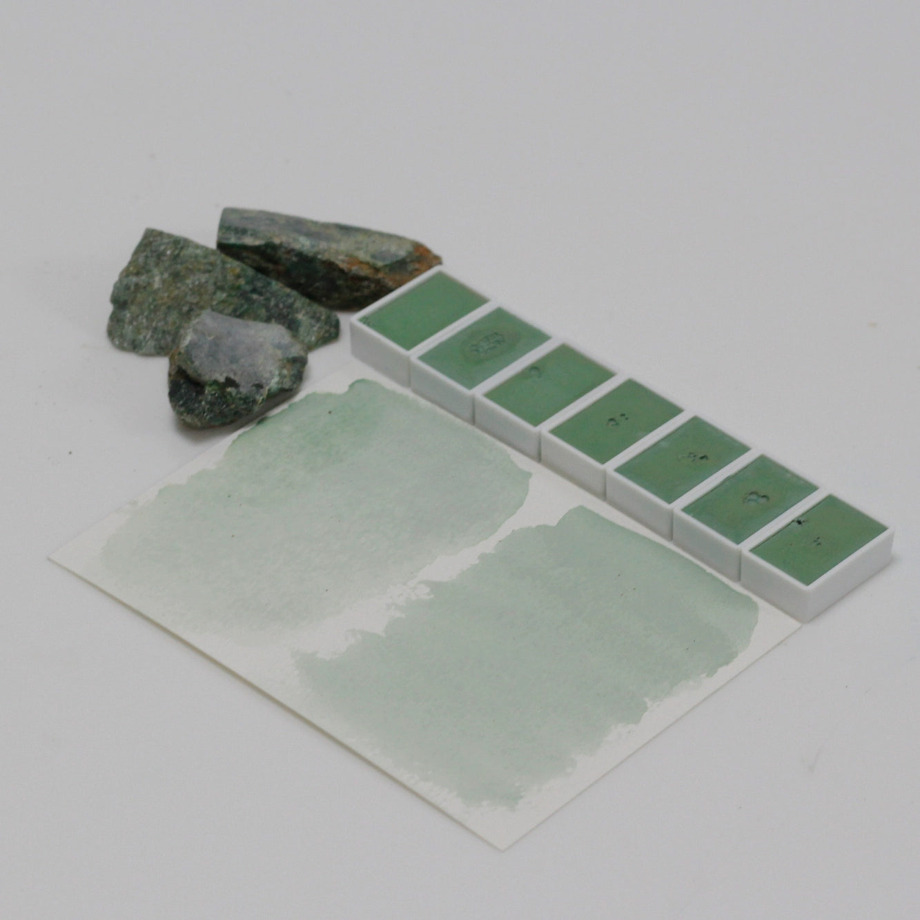 Emerald natural mineral emerald green handmade solid watercolor pigment is opaque.