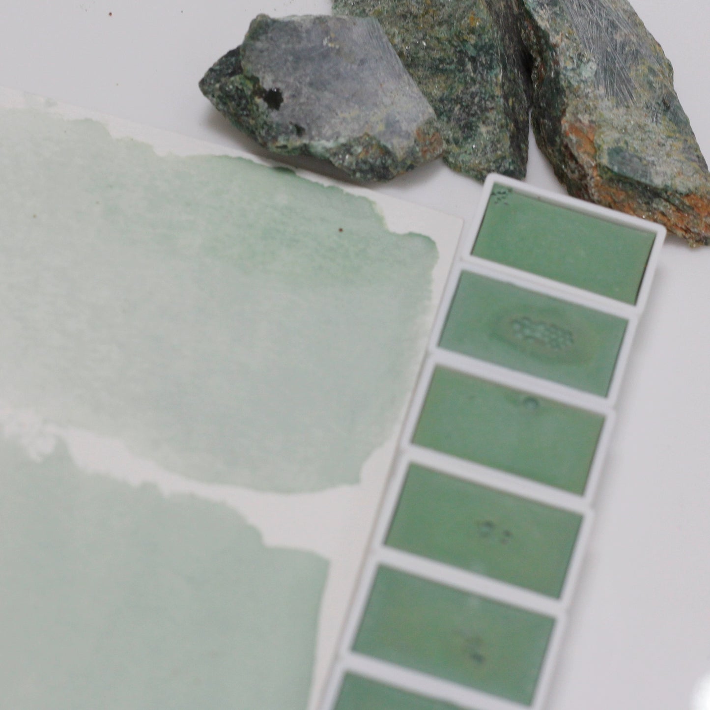 Emerald natural mineral emerald green handmade solid watercolor pigment is opaque.