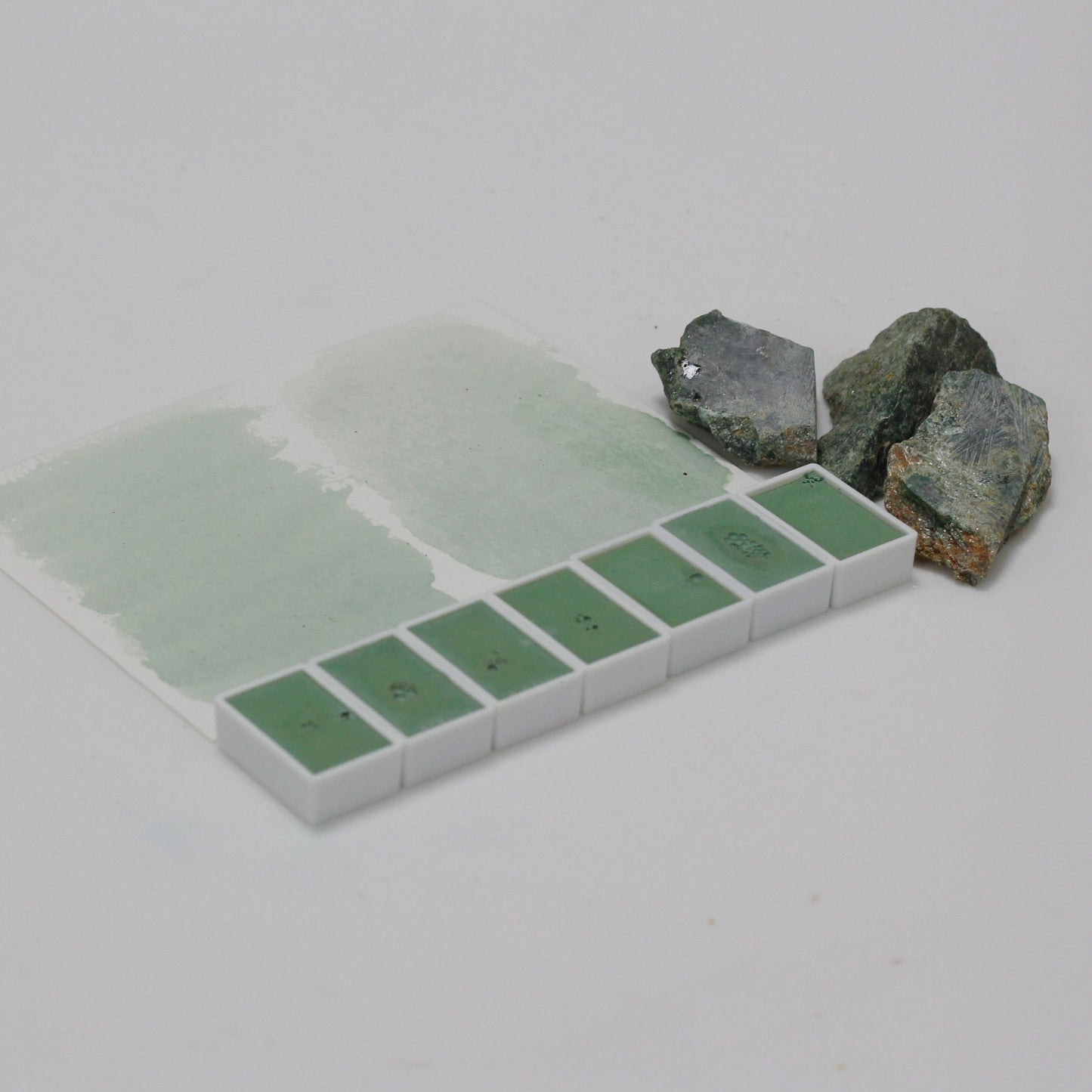 Emerald natural mineral emerald green handmade solid watercolor pigment is opaque.